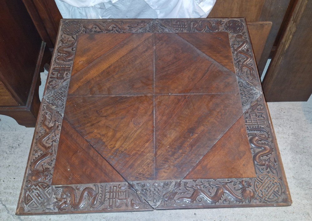 Oriental carved Envelope games table. View III