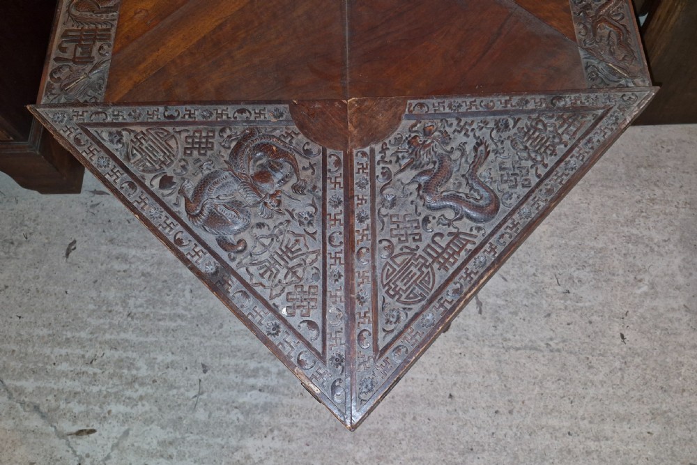Oriental carved Envelope games table. View IV