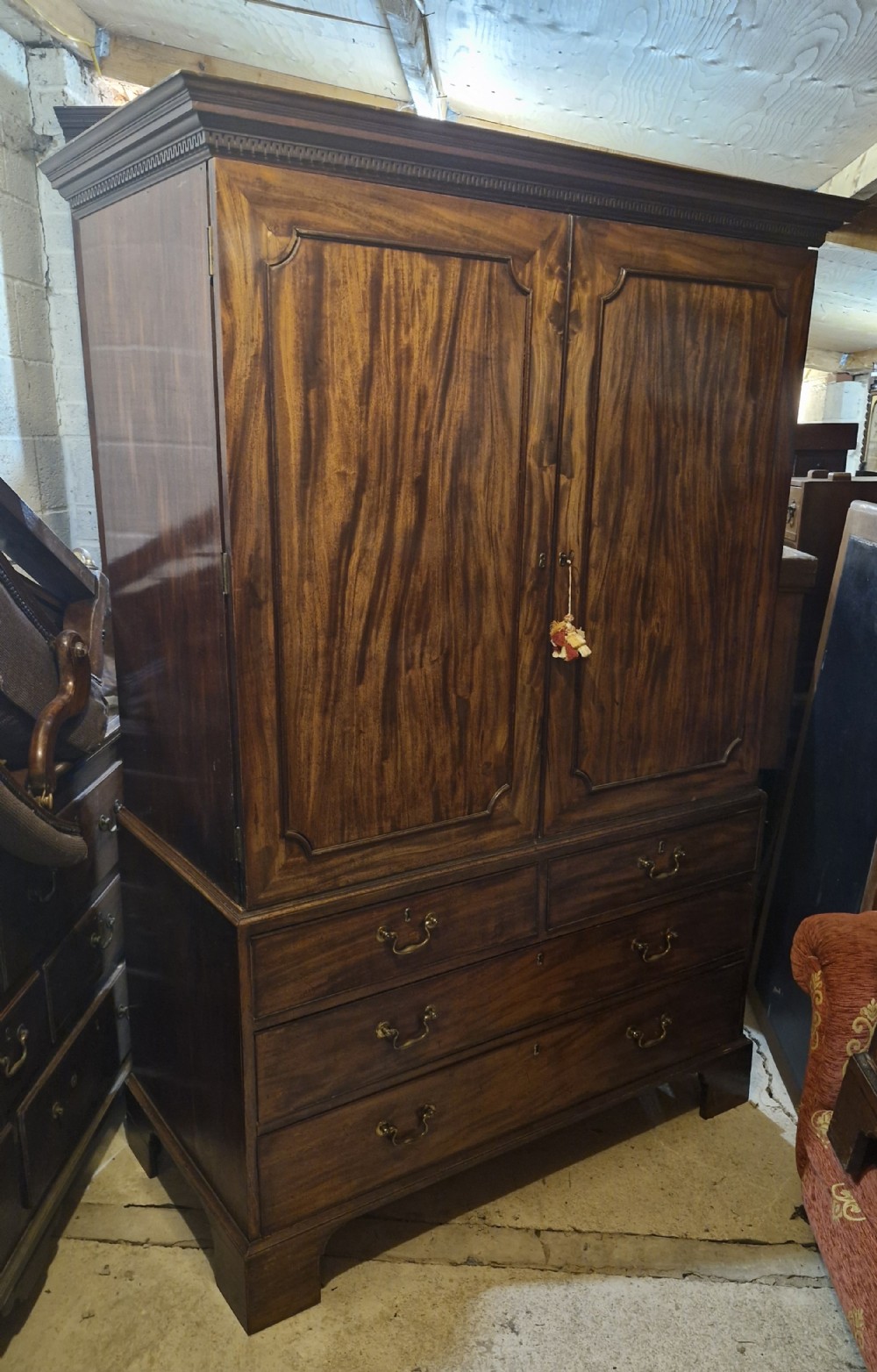 Late Georgian mahogany linen press 