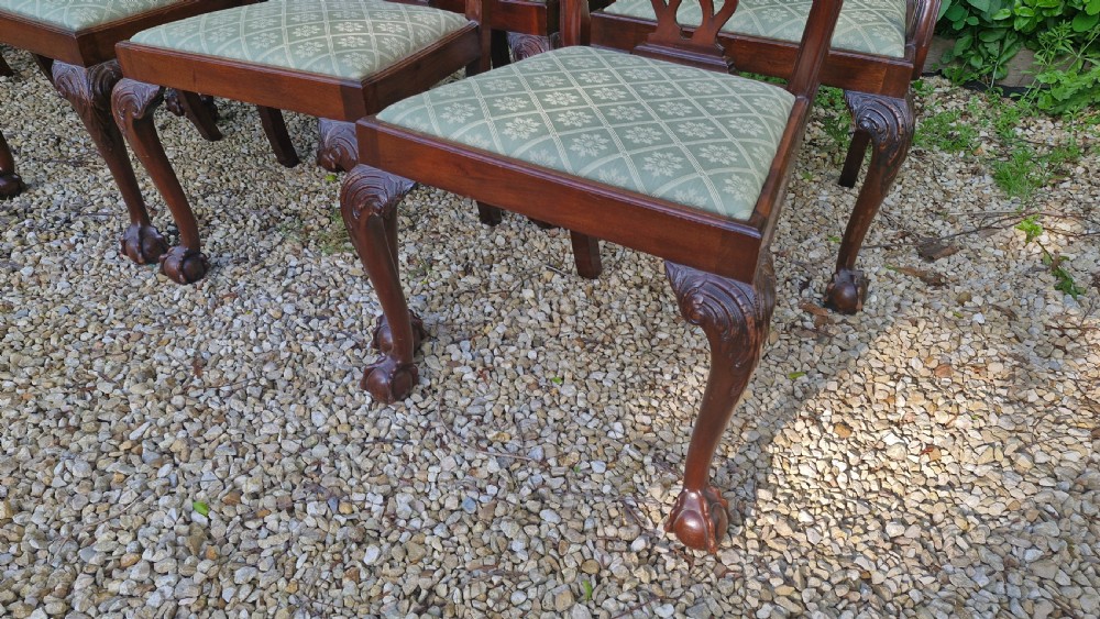 Set of 12 Edwardian mahogany Chippendale style dining chairs.  View XI