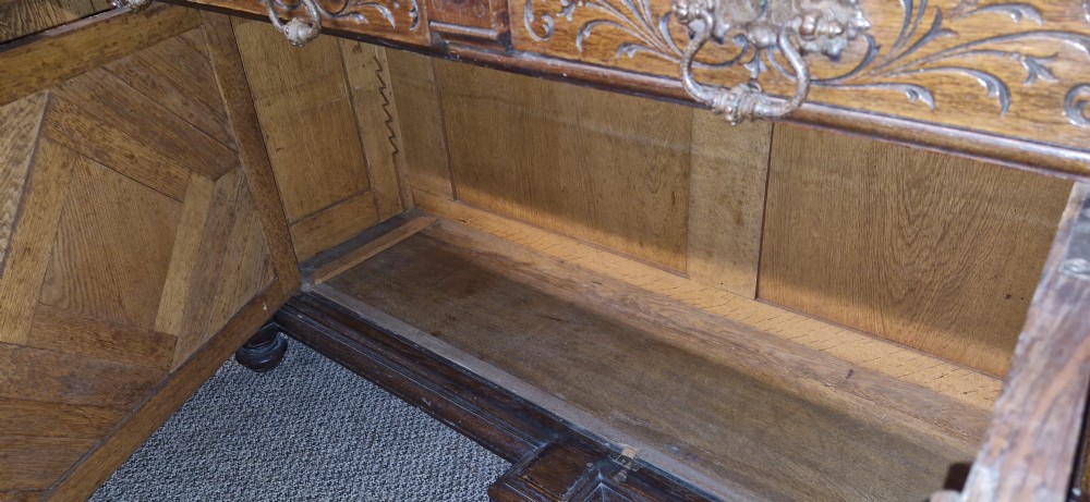 Late 19th century carved oak side cabinet.  View XVIII