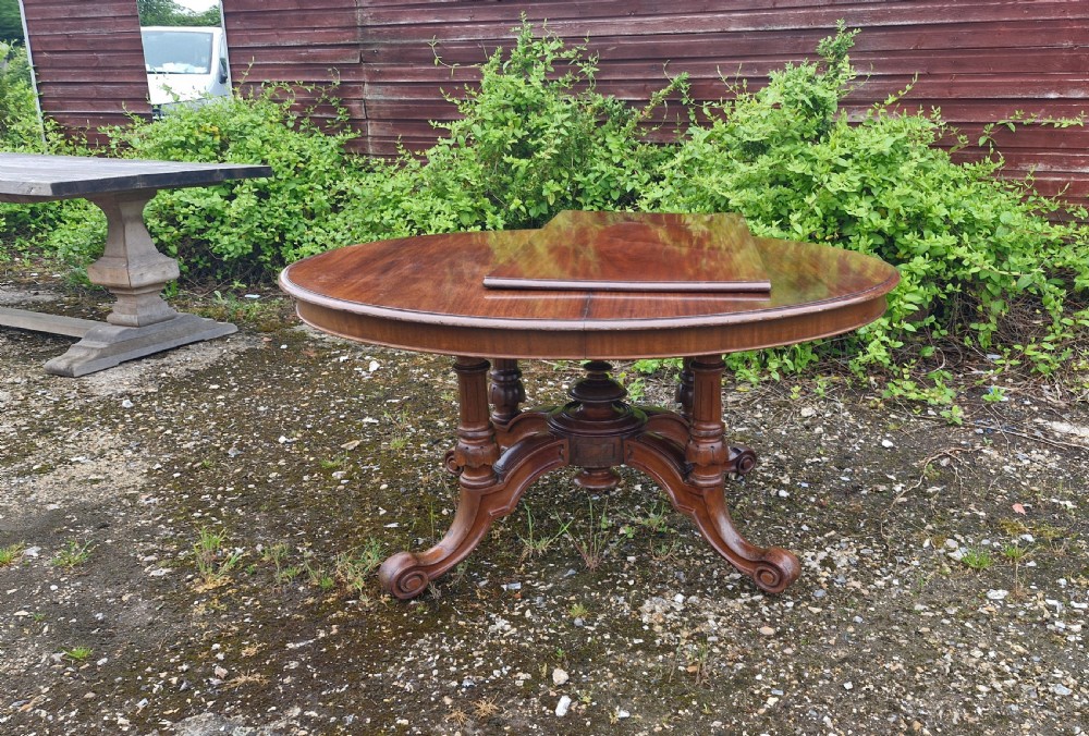 Unusual Victorian mahogany extending dining table.  View IV