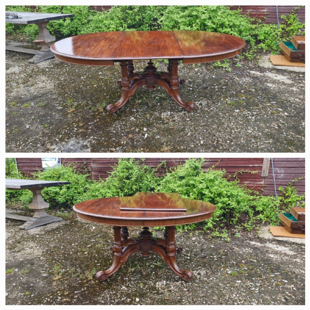 Unusual Victorian mahogany extending dining table.  View VI