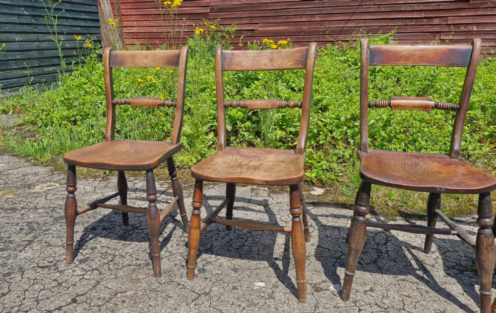 Harlequin set of 4 mid 19th century Windsor kitchen dining chairs. View IV