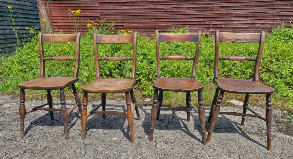 Harlequin set of 4 mid 19th century Windsor kitchen dining chairs. View VI
