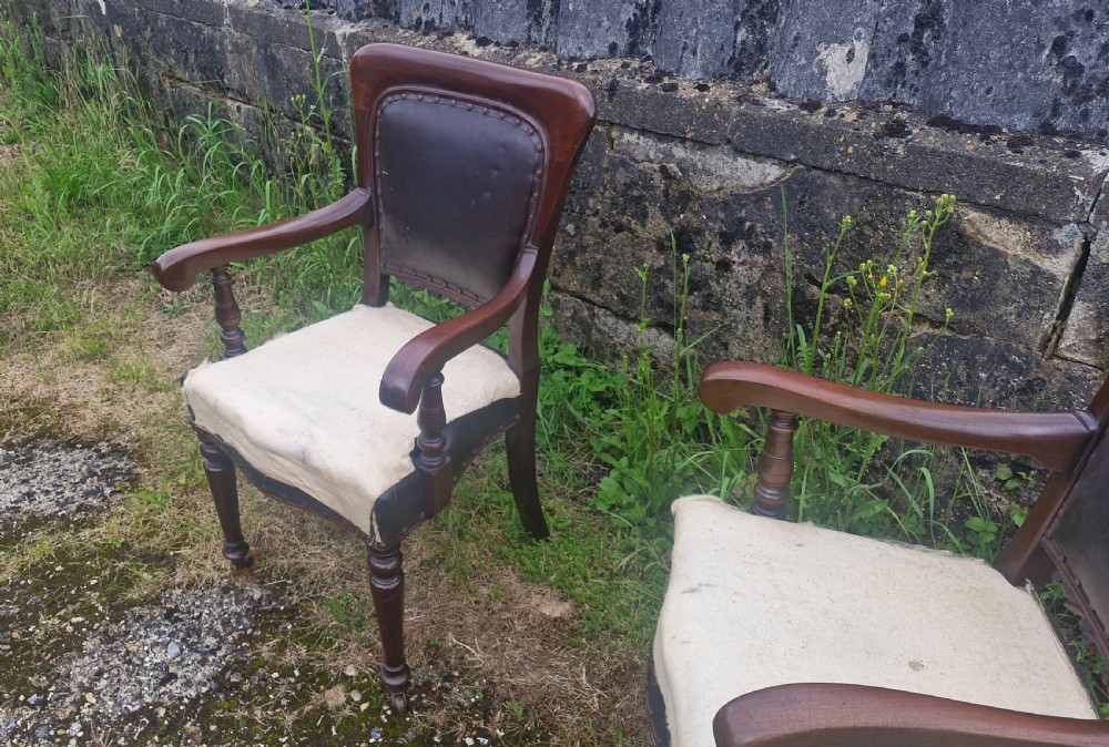 Pair of Late mahogany library desk armchairs.  View IV