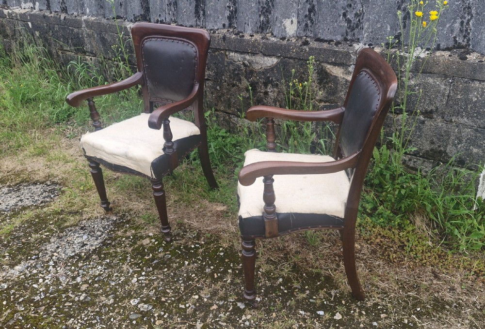 Pair of Late mahogany library desk armchairs.  View V