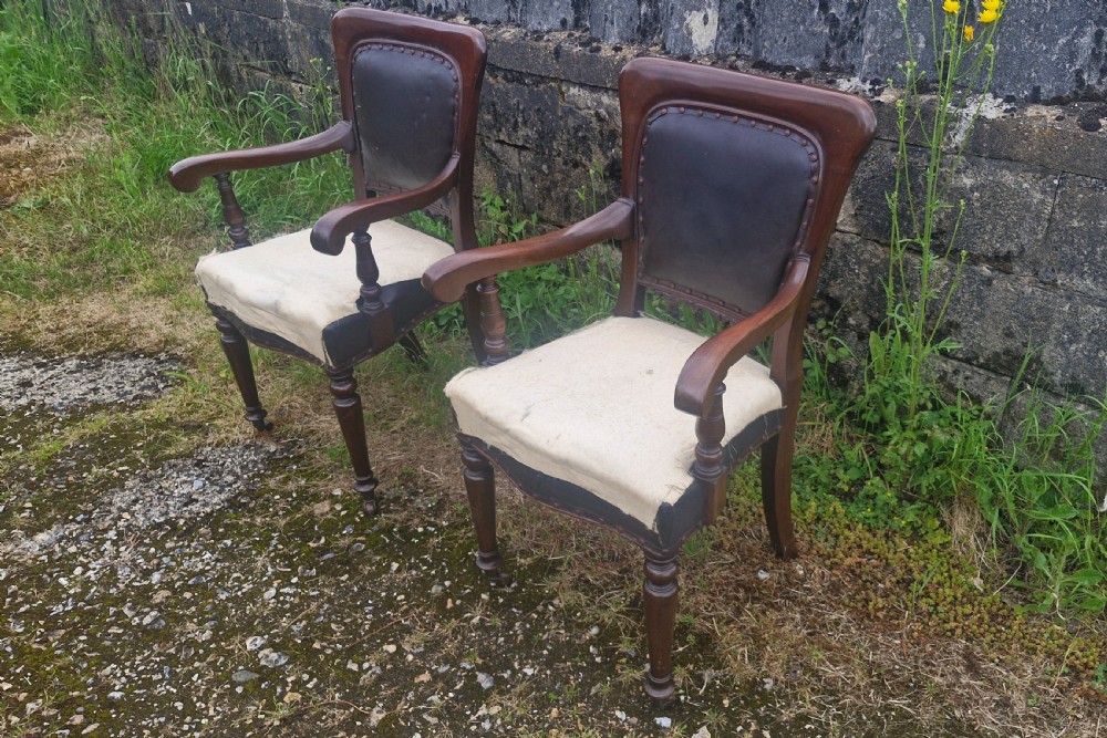 Pair of Late mahogany library desk armchairs.  View VI