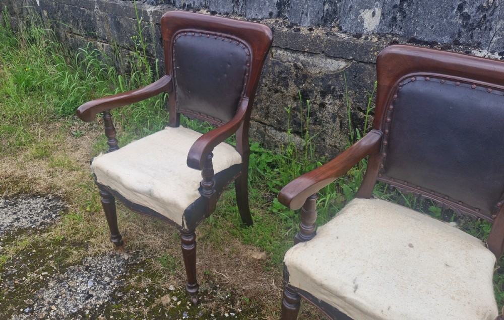 Pair of Late mahogany library desk armchairs.  View VIII