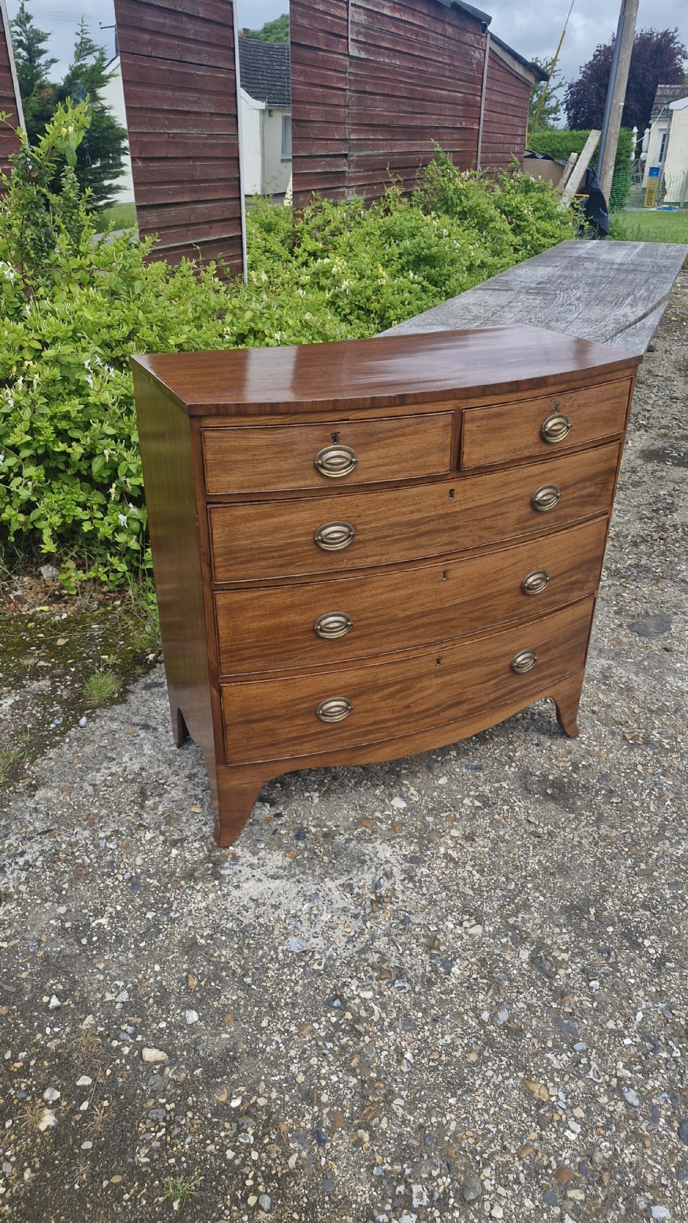 19th century mahogany bow front chest of drawers.  View II