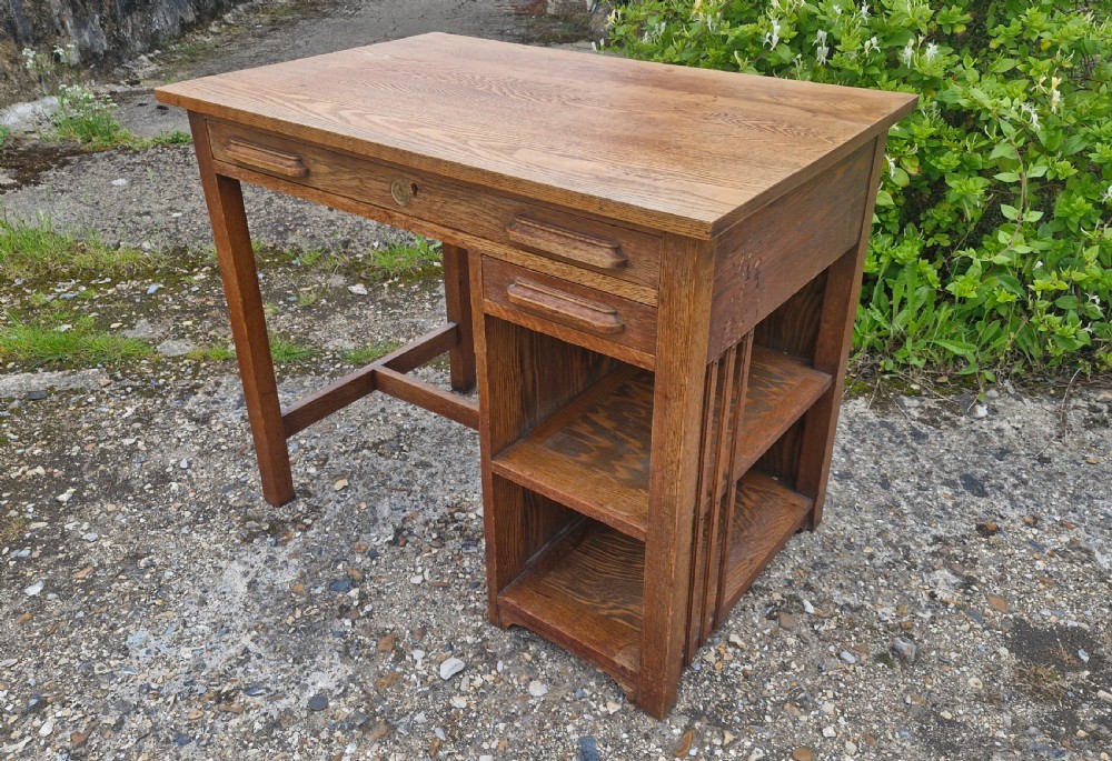 Rare early 20th century oak single pedestal desk by Globe Wernicke. 