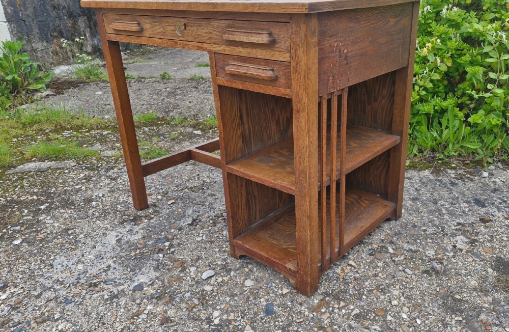 Rare early 20th century oak single pedestal desk by Globe Wernicke.  View VII