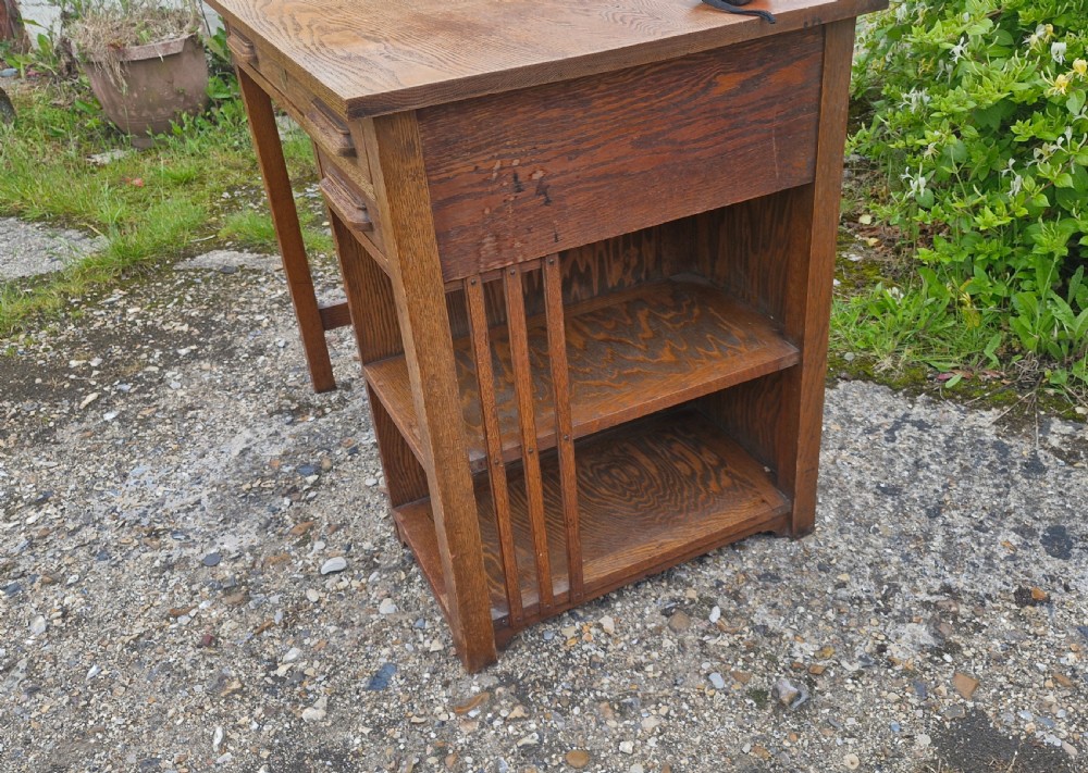 Rare early 20th century oak single pedestal desk by Globe Wernicke.  View VIII