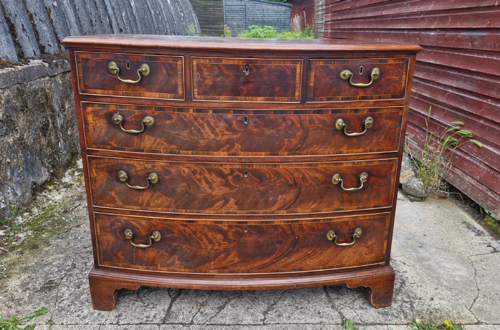 Late 18th century mahogany bow front chest of drawers.  View V
