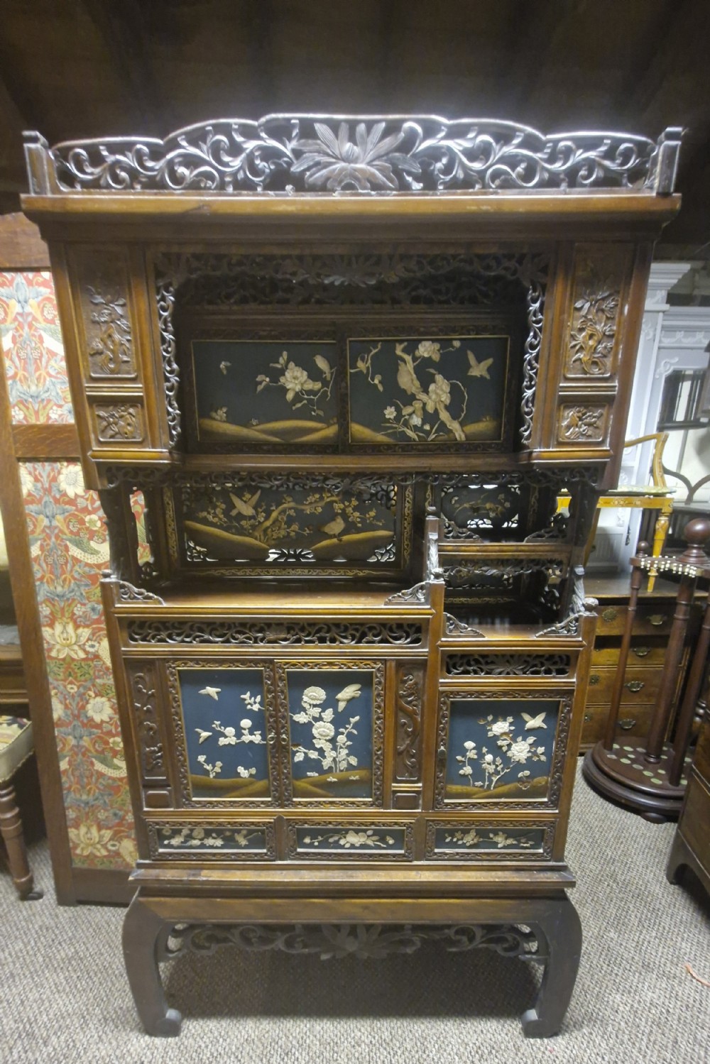 Japanese inlaid and carved cabinet on stand. 