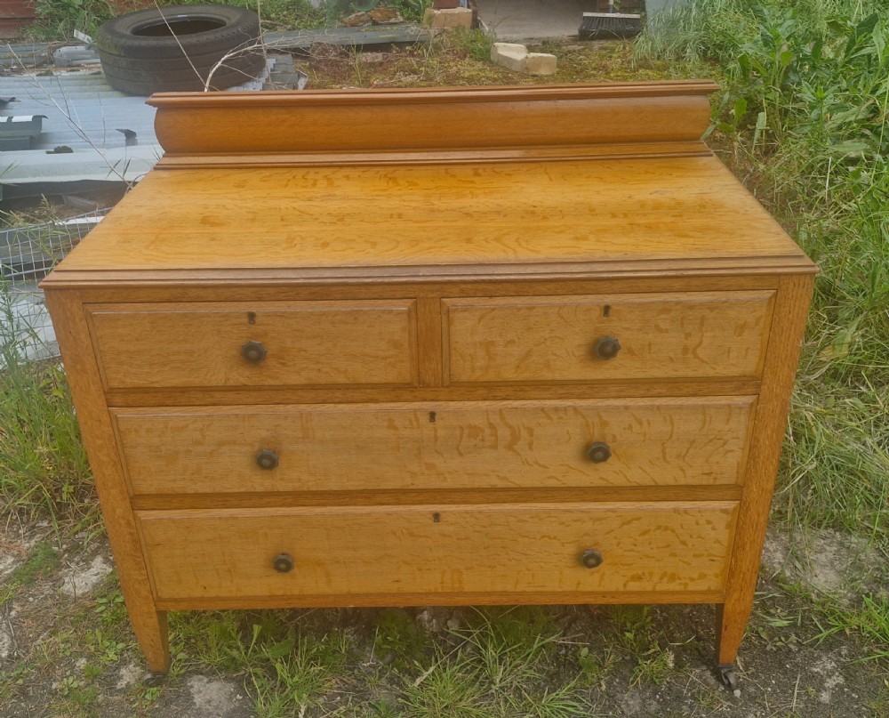 Good practical golden oak chest of drawers. View VI