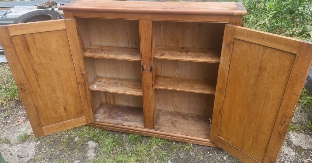 Useful late Victorian 2 door pine kitchen cupboard.  View III