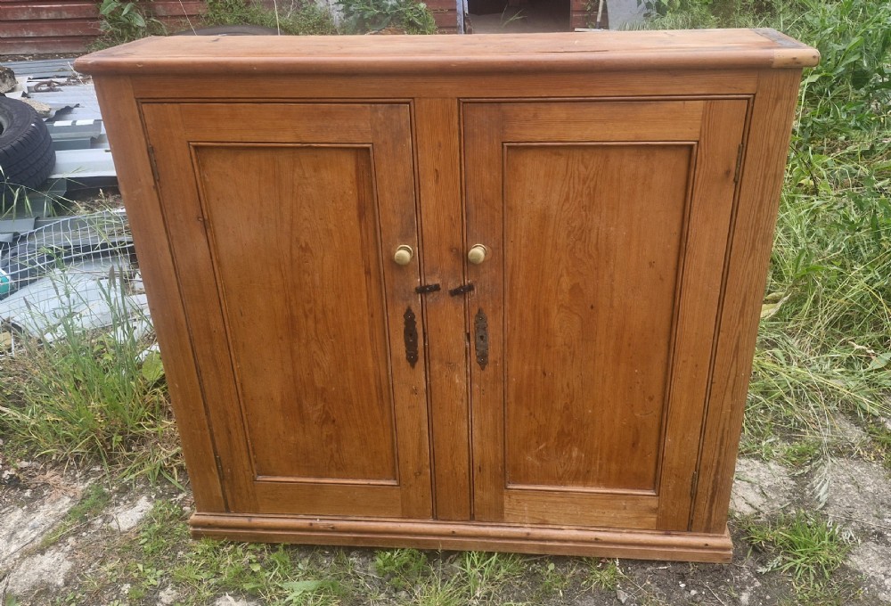 Useful late Victorian 2 door pine kitchen cupboard.  View VI