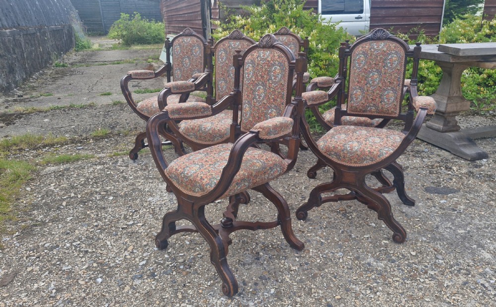 Set of 6 walnut X frame hall chairs.  View V