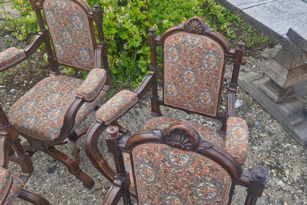 Set of 6 walnut X frame hall chairs.  View VII