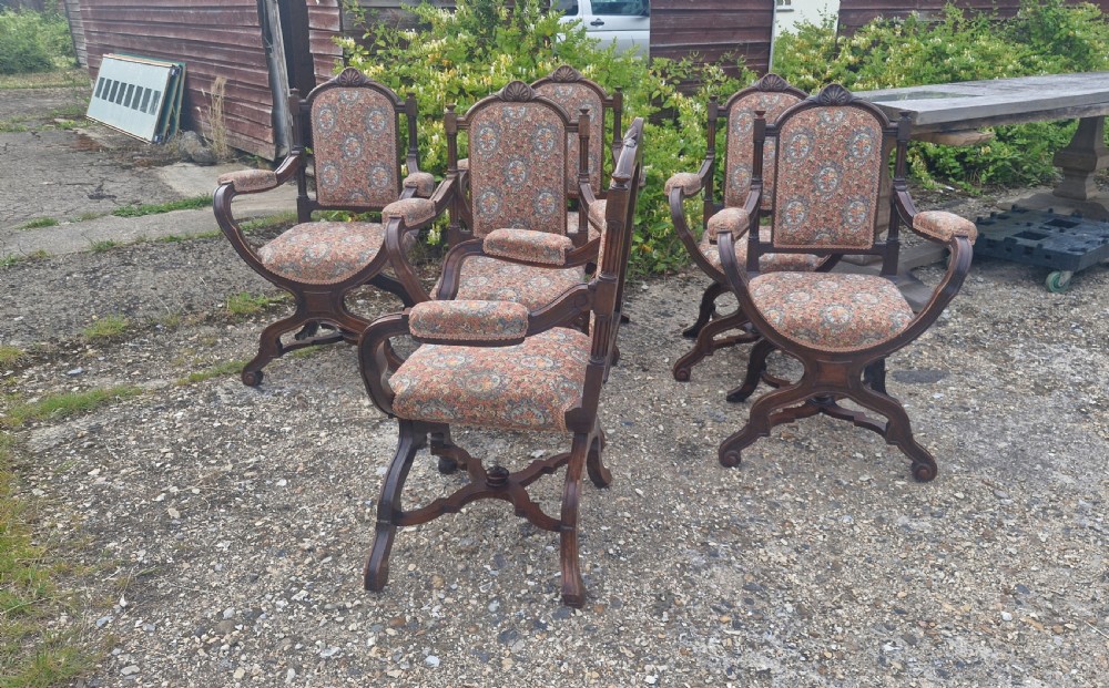 Set of 6 walnut X frame hall chairs.  View VIII