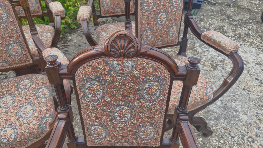 Set of 6 walnut X frame hall chairs.  View XIV