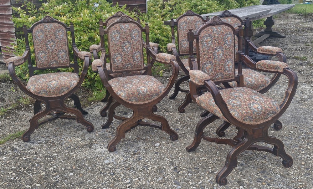 Set of 6 walnut X frame hall chairs. 