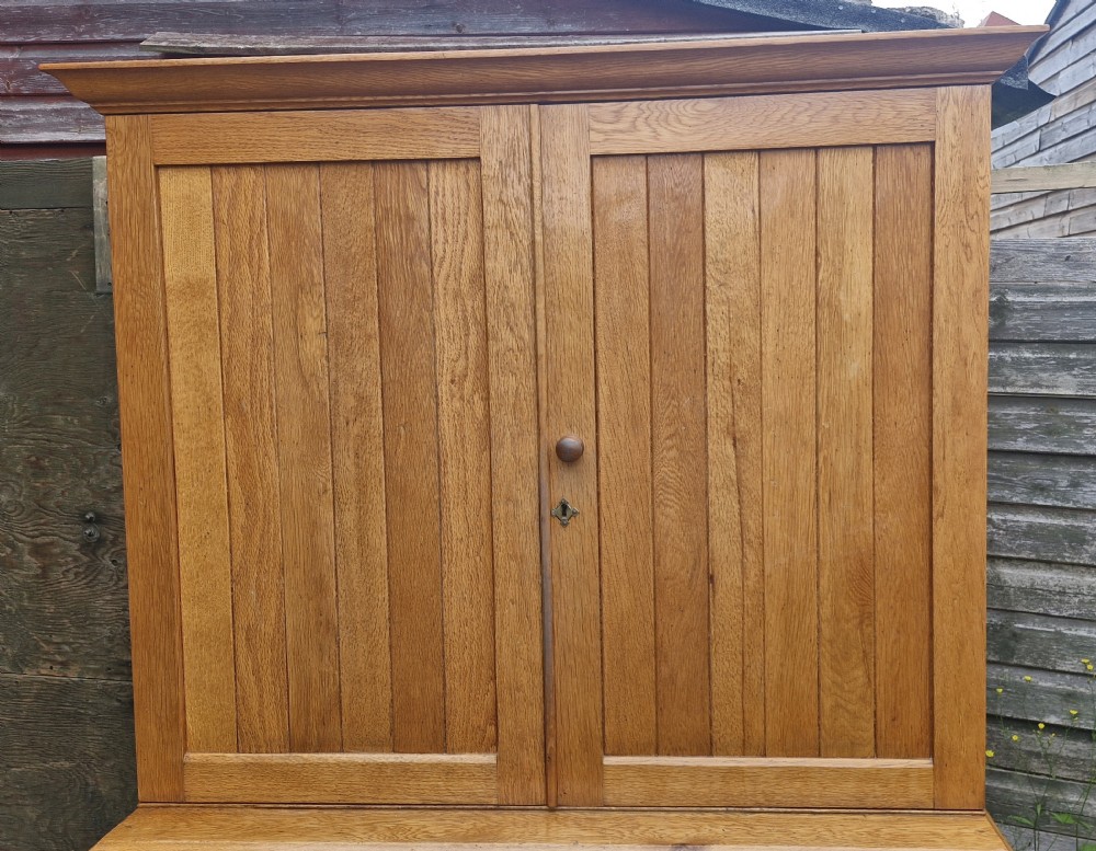 Useful 2 part oak housekeepers cupboard.  View IX