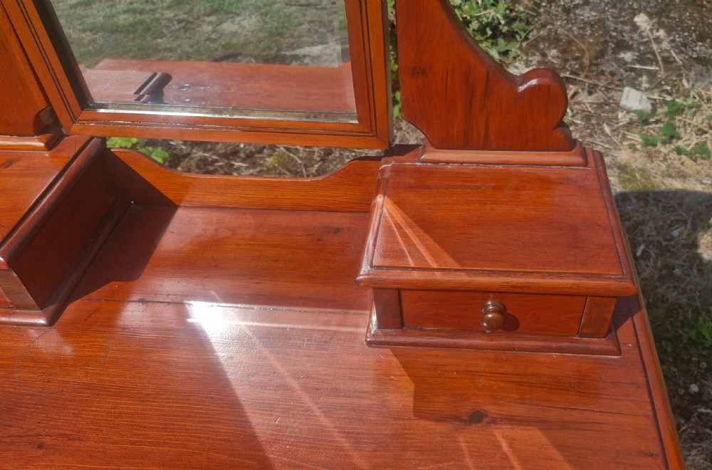 Late Victorian stained pine dressing chest. View II