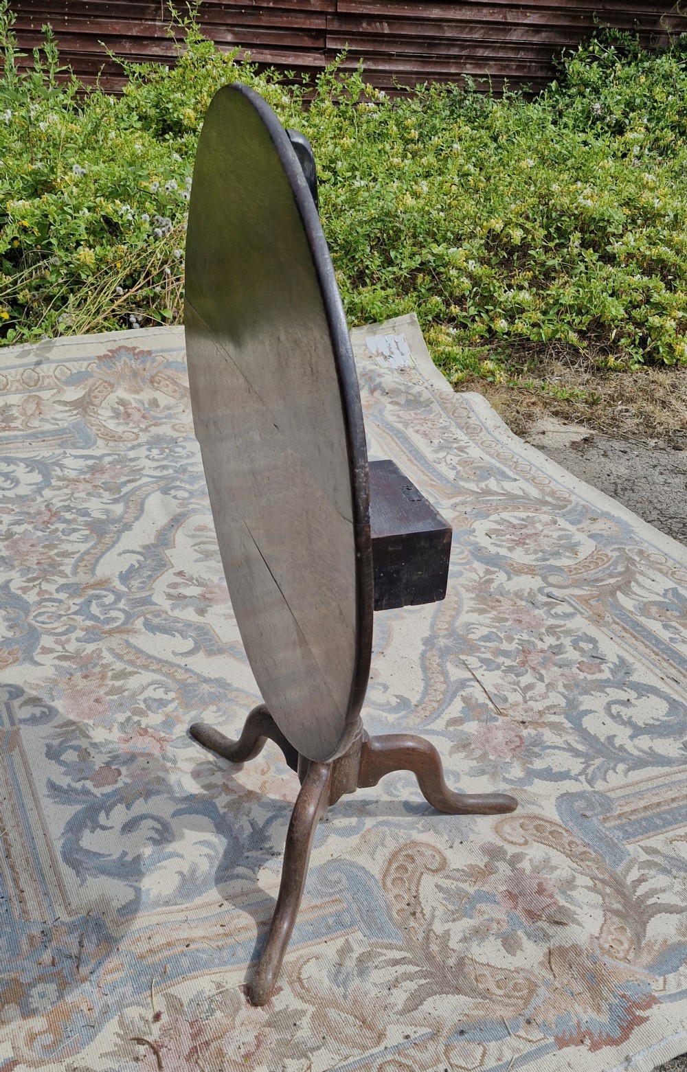 Georgian oak revolving top tripod occasional table