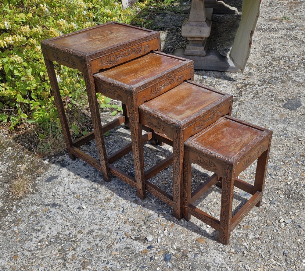 Nest of 4 Oriental occasional tables. View III