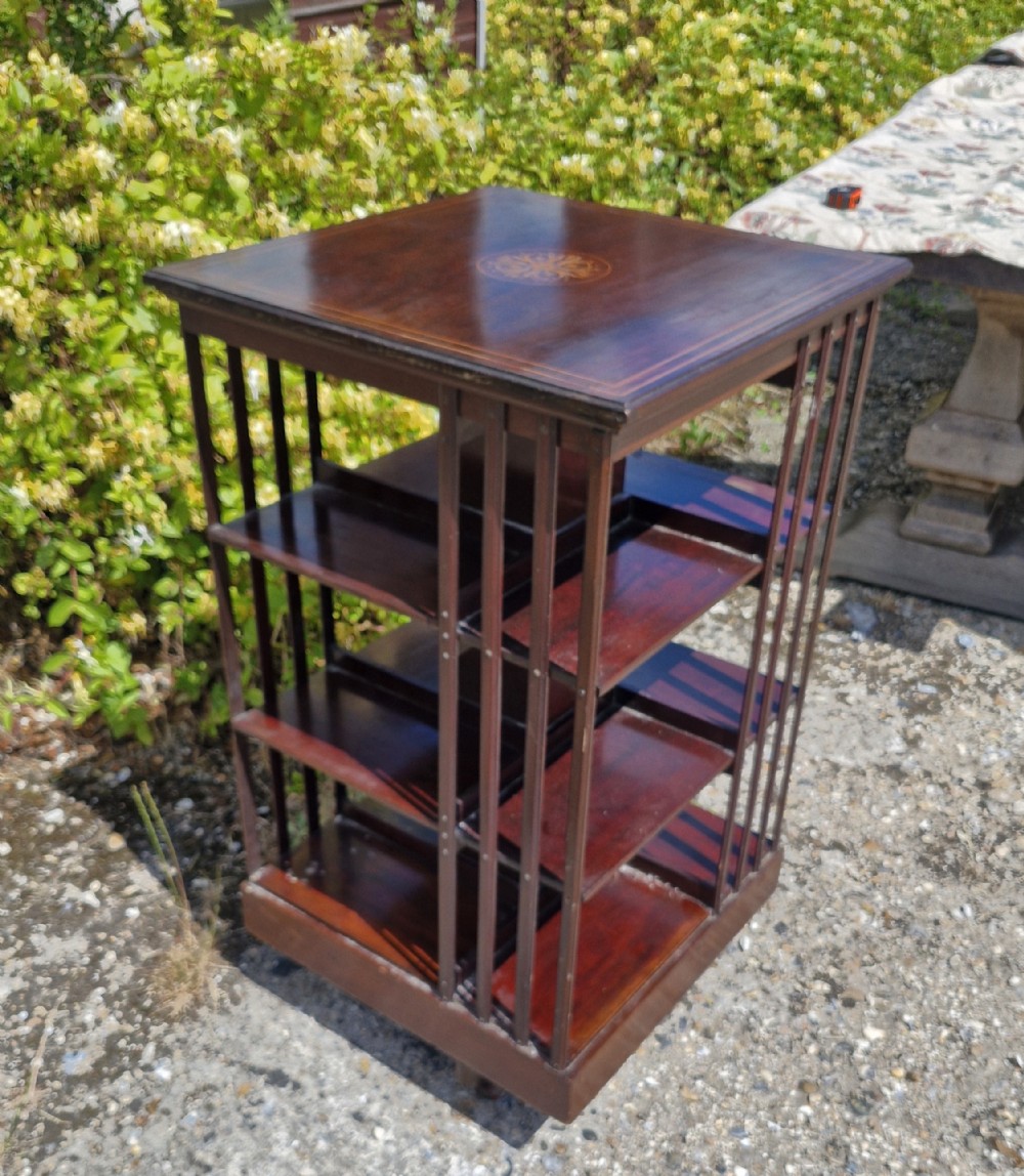 Edwardian inlaid mahogany 4 tier revolving bookcase. 