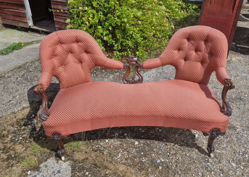 Victorian carved shaped back conversation seat. View II