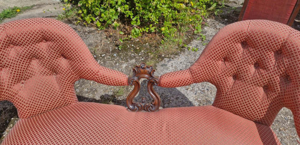 Victorian carved shaped back conversation seat. View IV