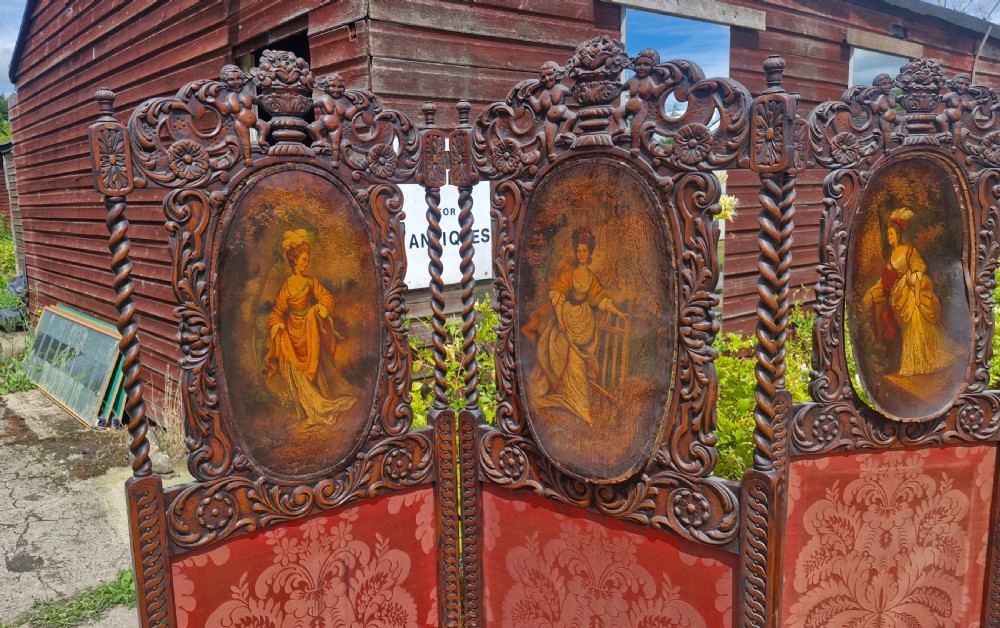 Pair of carved oak folding dressing screens. View V