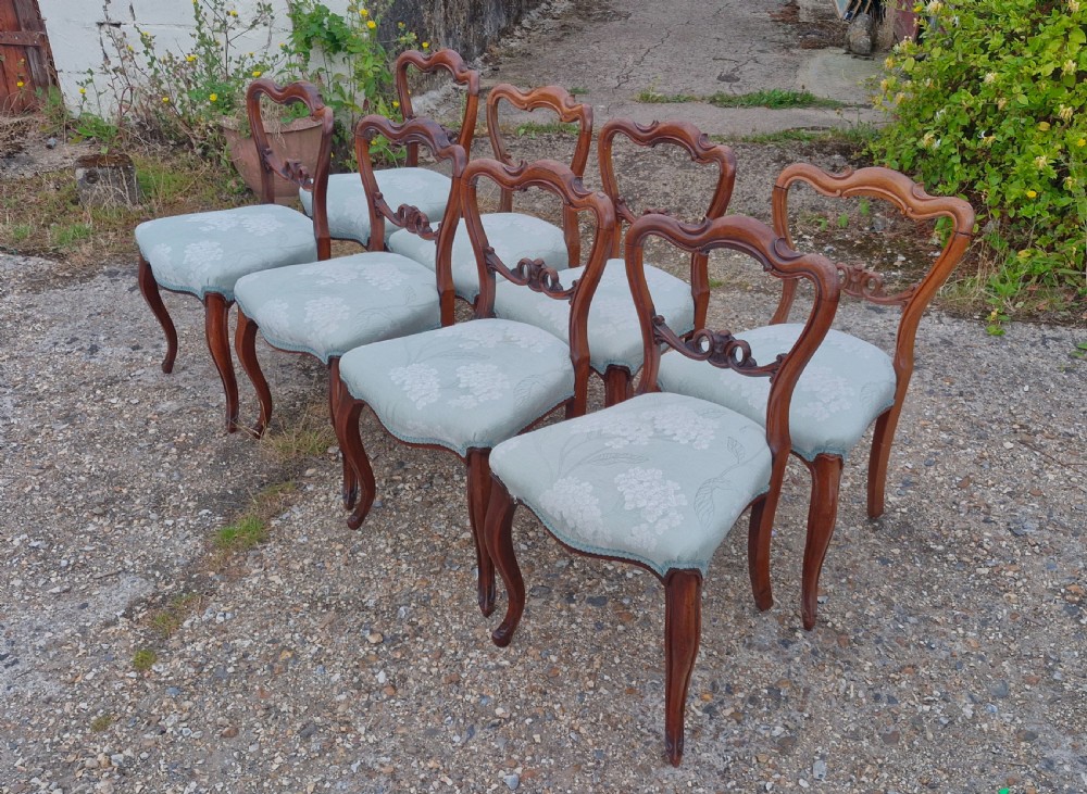 Set of 8 mid 19th century rosewood chairs.