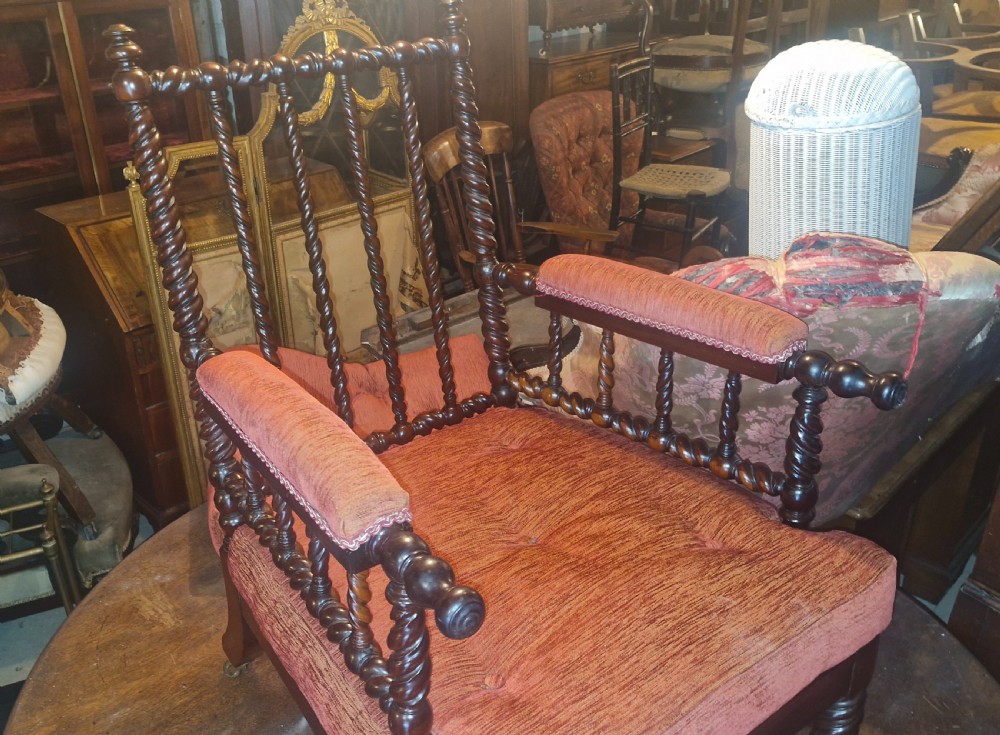 Regency rosewood turned framed spindle back armchair.  View XVI