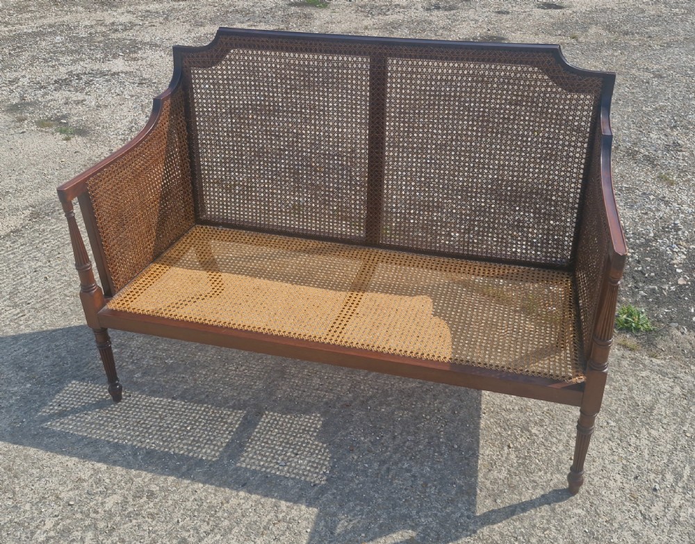 Caned bergere 2 seater sofa. View V