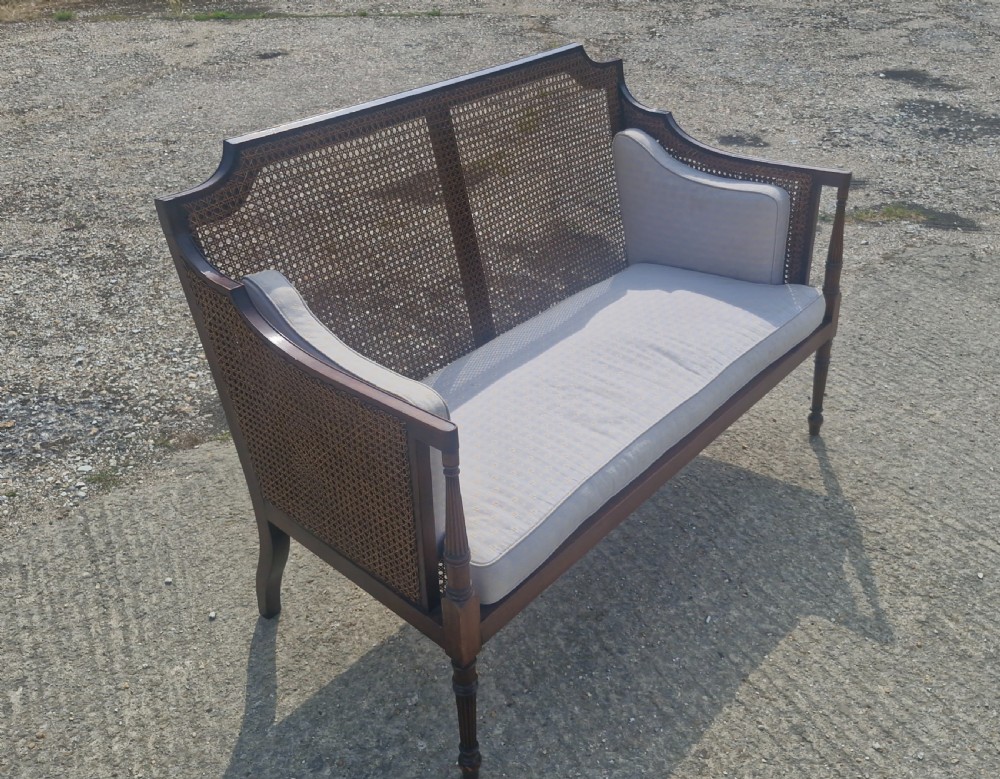Caned bergere 2 seater sofa. View XI