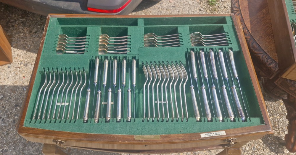 2 drawer 10 place settings canteen of cutlery by Garrards London. View XI