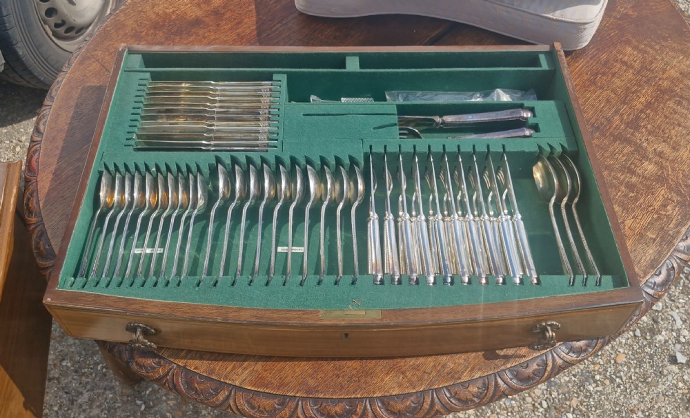 2 drawer 10 place settings canteen of cutlery by Garrards London. View XVI