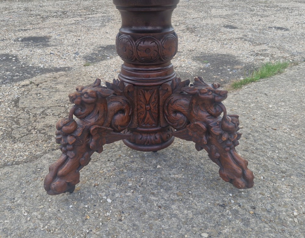 Pair of Victorian Gothic carved oak console tables.  View VI