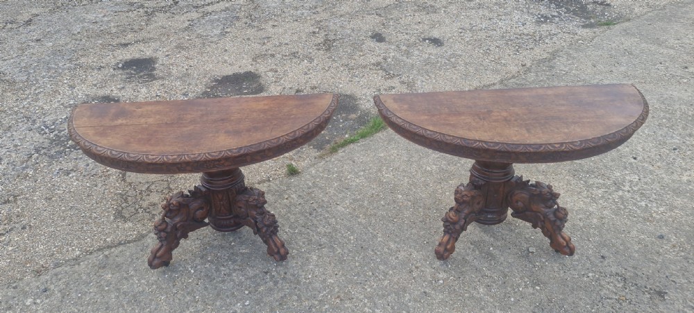 Pair of Victorian Gothic carved oak console tables.  View XIII