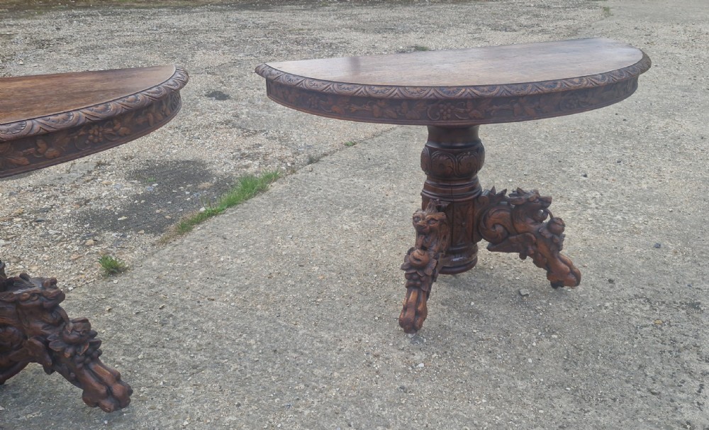 Pair of Victorian Gothic carved oak console tables.  View XIV