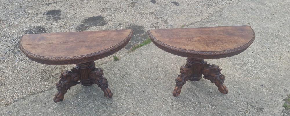 Pair of Victorian Gothic carved oak console tables.  View XV