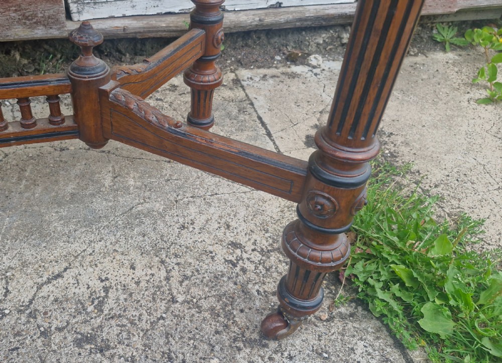 Victorian oak games table by Jones,Marsh and Cribb. View IX