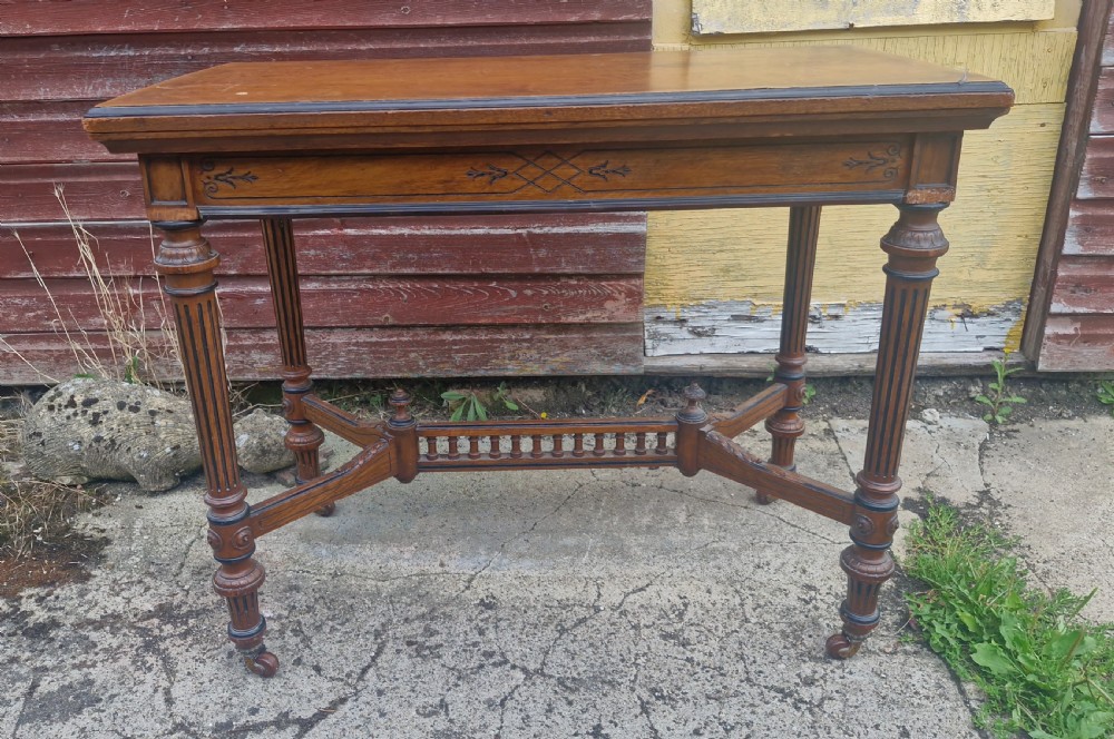 Victorian oak games table by Jones,Marsh and Cribb. View XI