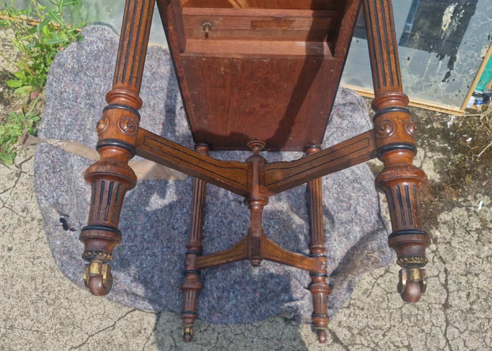 Victorian oak games table by Jones,Marsh and Cribb. View XVI