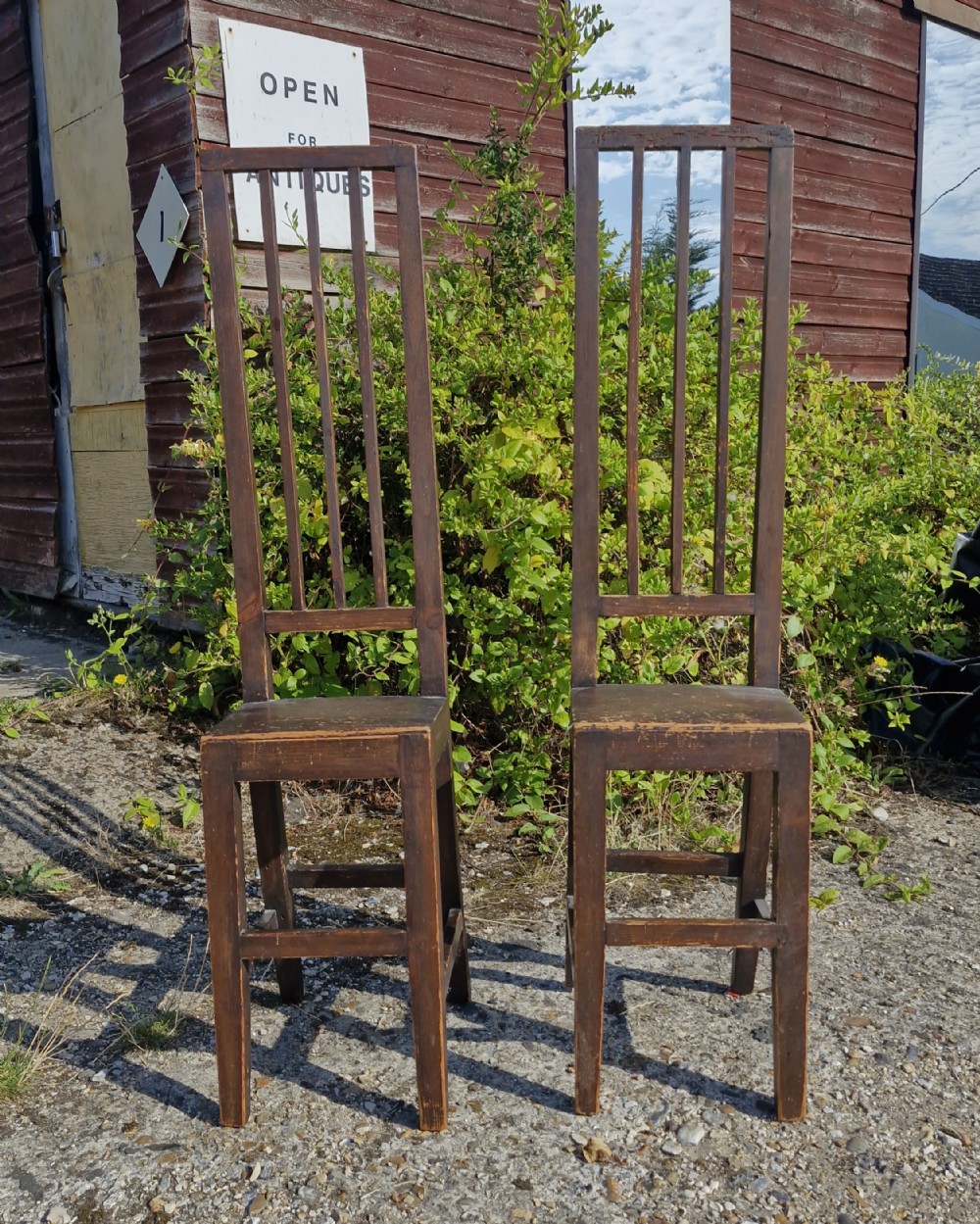 Pair of 19th century high back child's correction chairs.