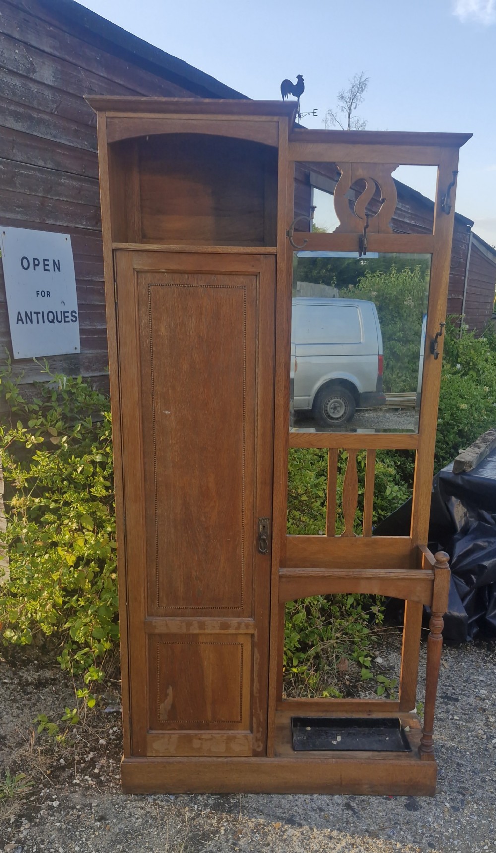 Unusual and useful early 20th century inlaid oak hall stand.